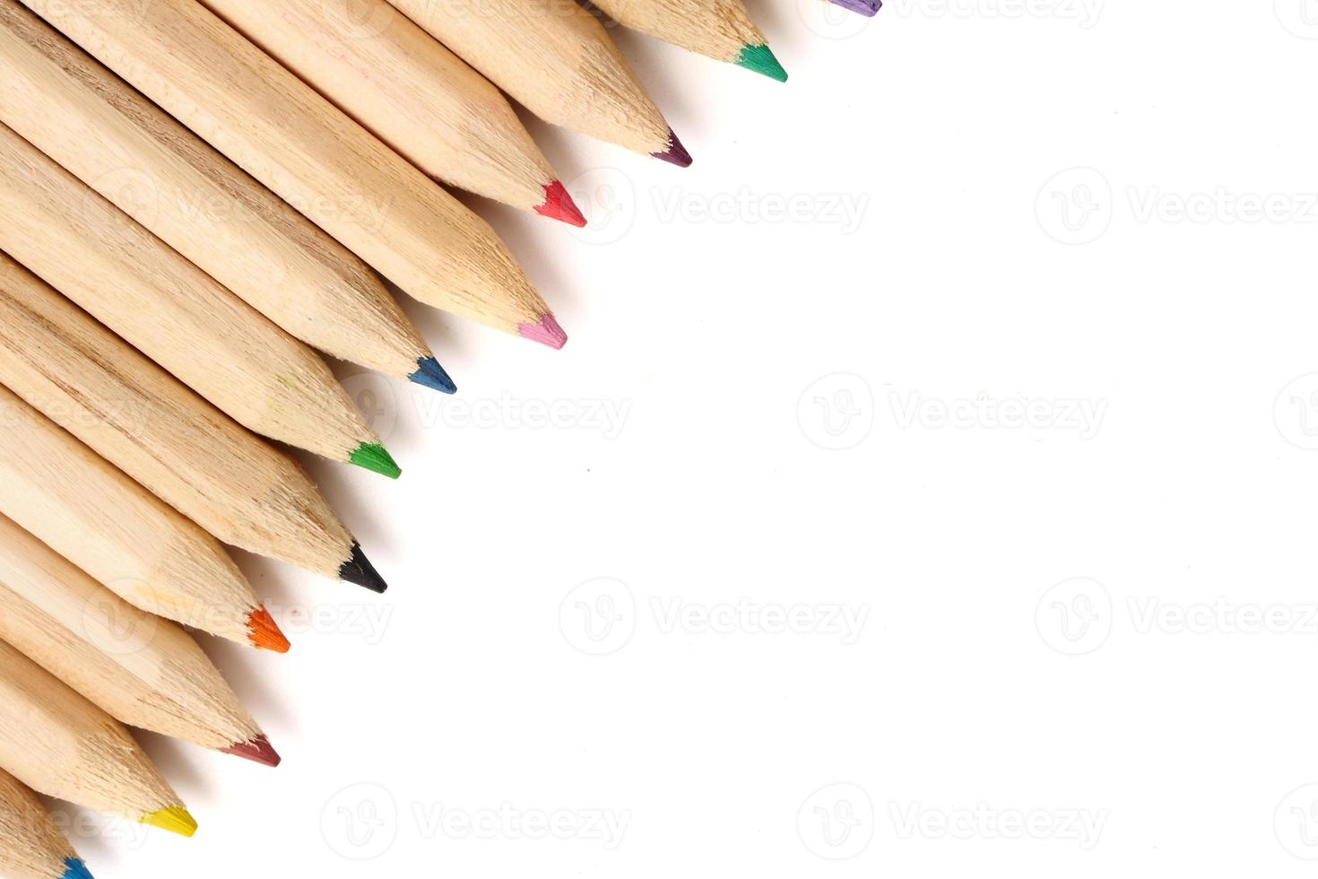 Color pencils on white background. Free space for text photo