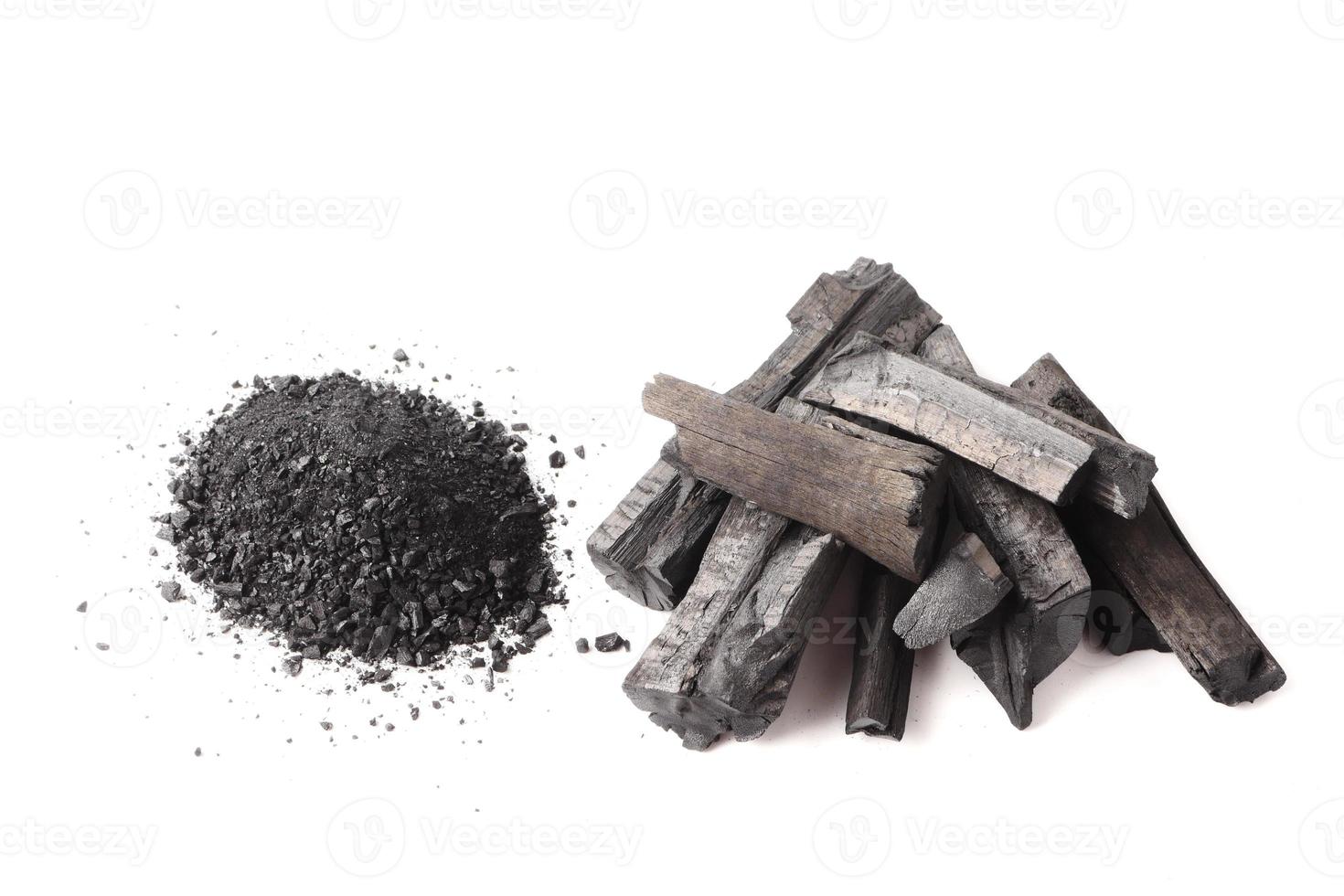 Charcoal and powder on white background. photo