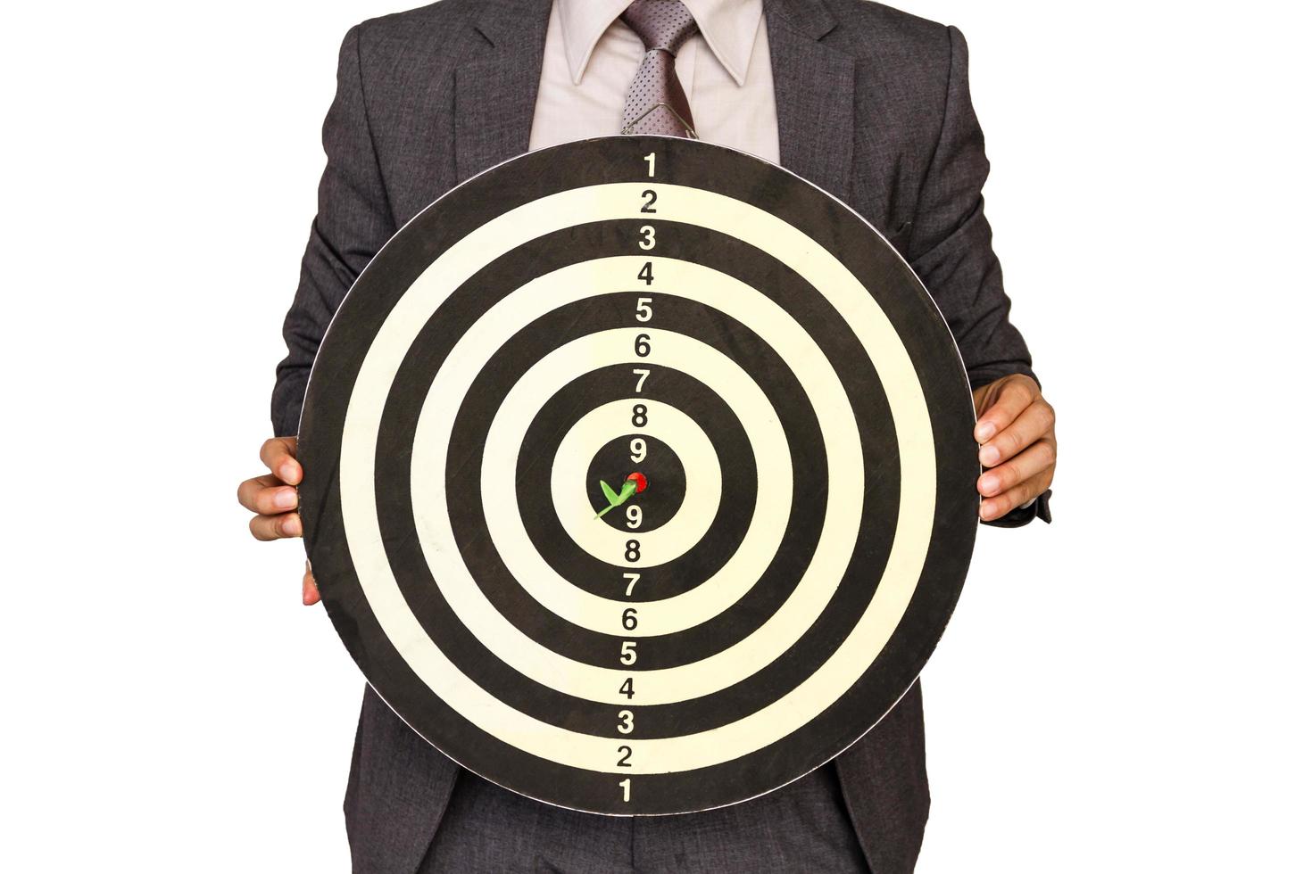 Businessman with target board on a white background. photo