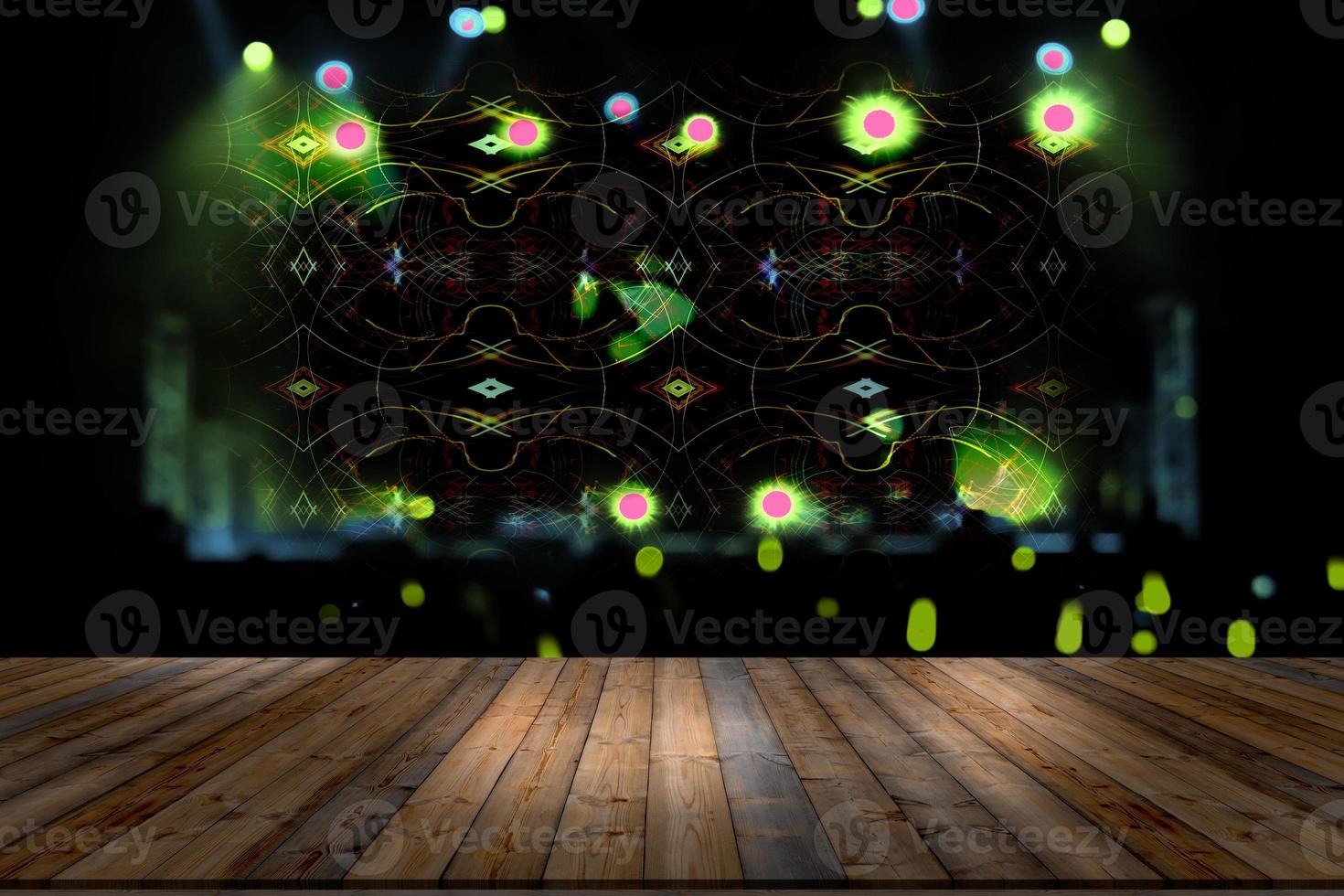 top desk with light bokeh in concert blur background,wooden table photo