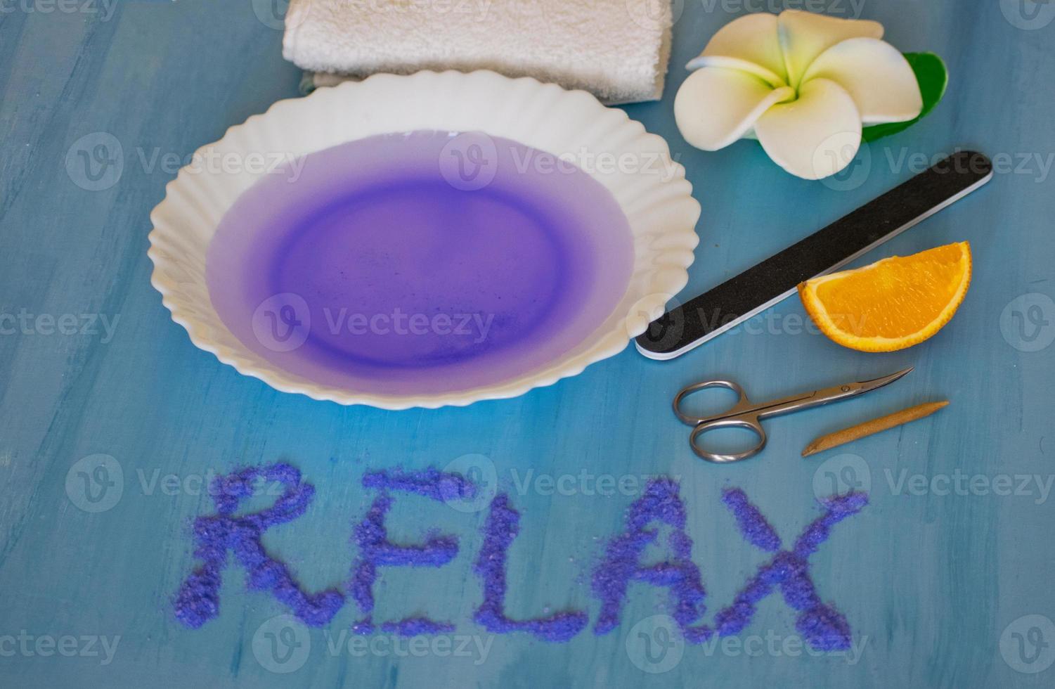 Nail Care. Manicure at home. A set of tools for manicure. Hands and spa relaxing. photo