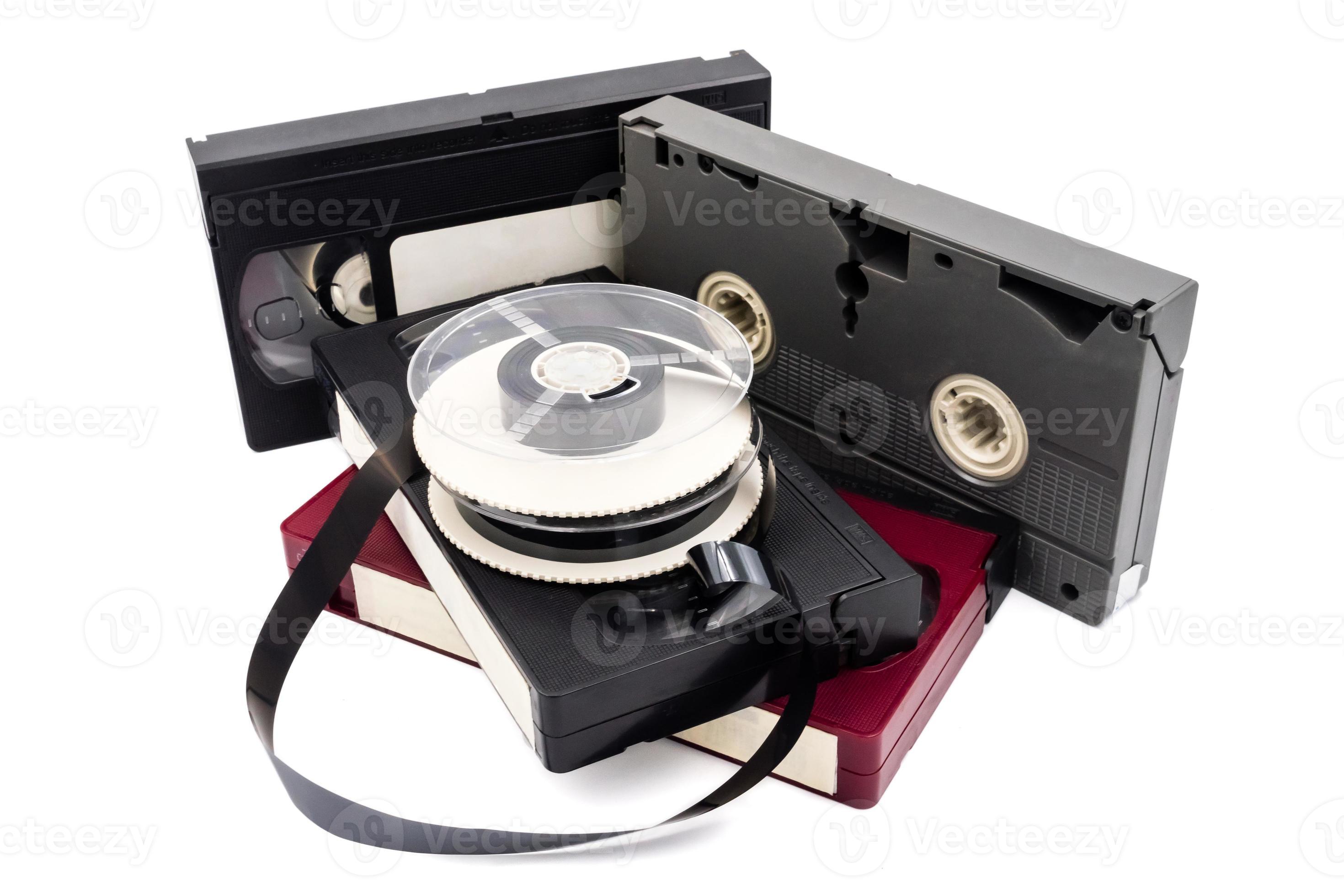 Video cassette tapes and reel on white background. 10723617 Stock Photo