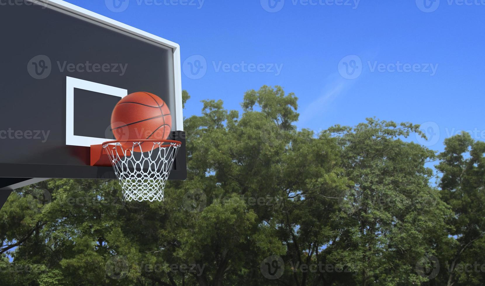 Ball for basketball and basketball hoop on white background. Hitting the ball in the basket photo