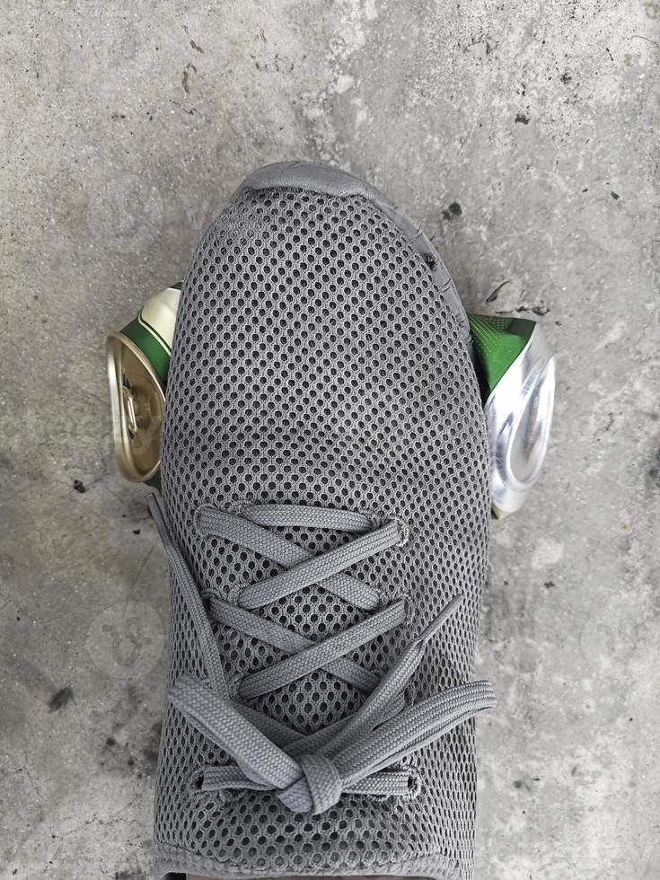 human foot stomp cans flat photo