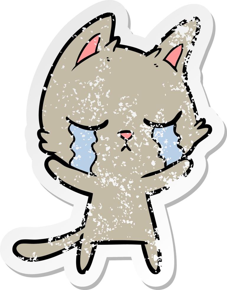 distressed sticker of a crying cartoon cat vector