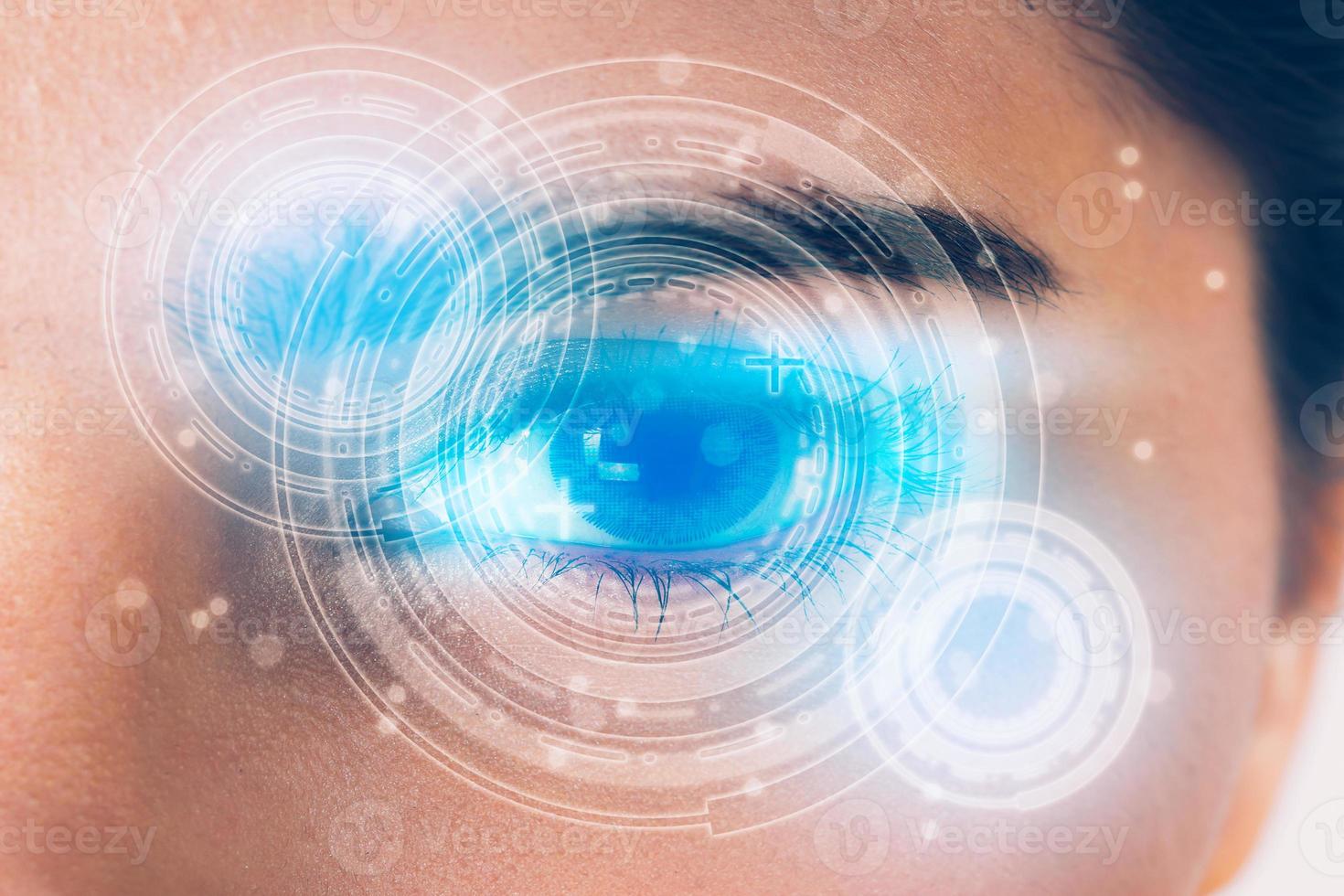Closeup of beautiful eye woman process scanning with technology, visual hologram, digital display information, medical and security computer with identity, system and verification concept. photo
