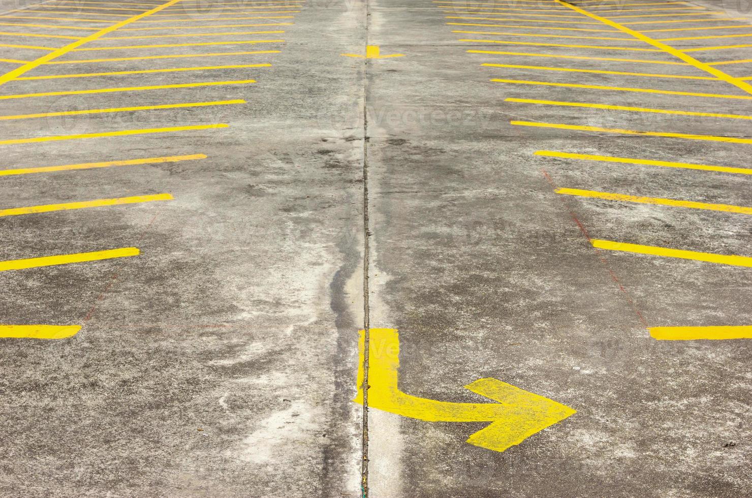 Yellow Lines Parking on concrete background photo