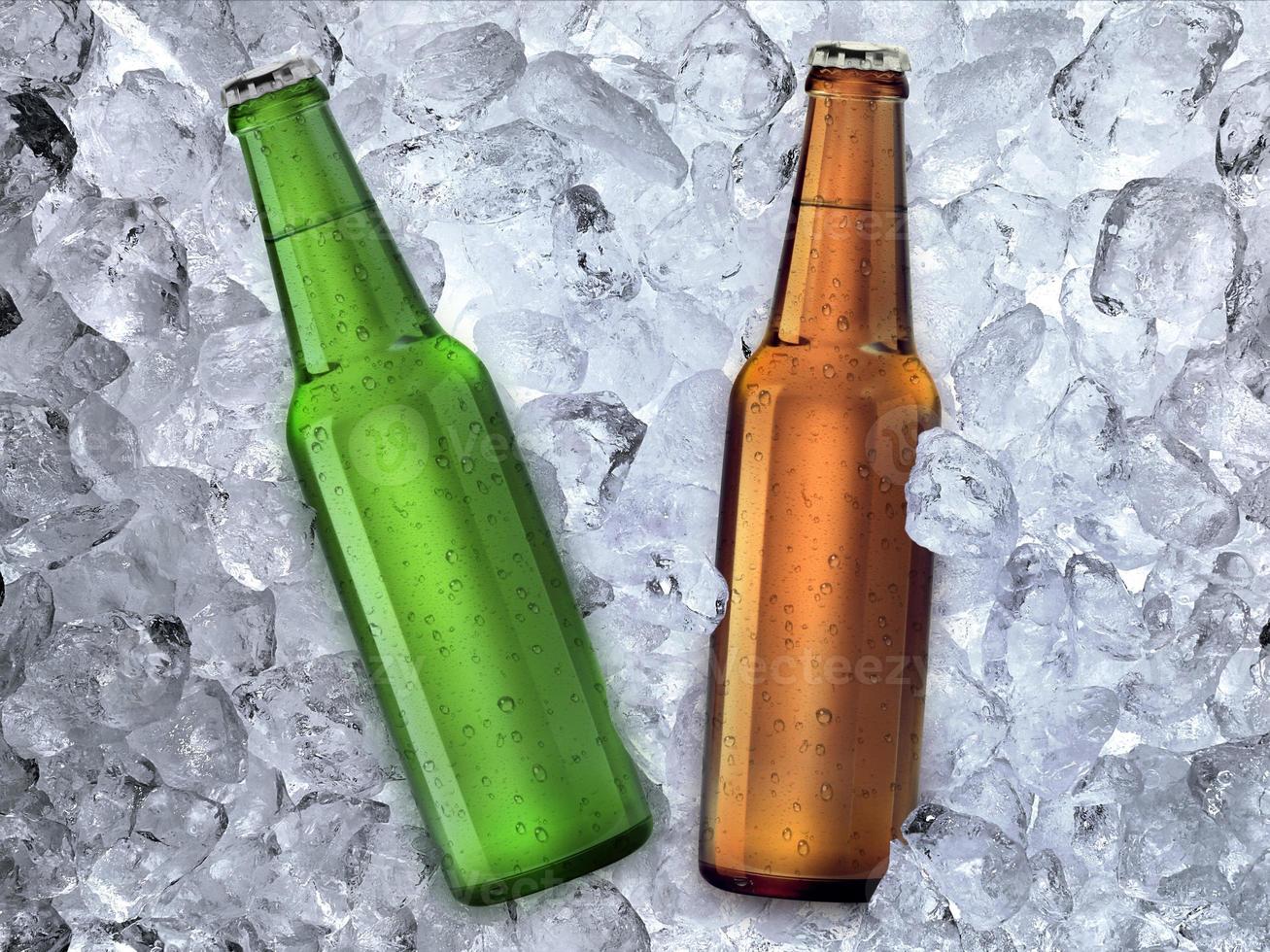 Beer bottle on ice cubes background photo