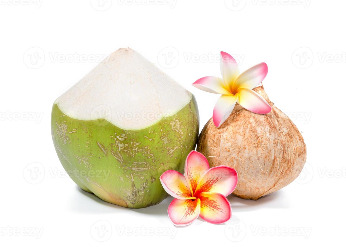 Coconut Water Drink with plumeria on background photo