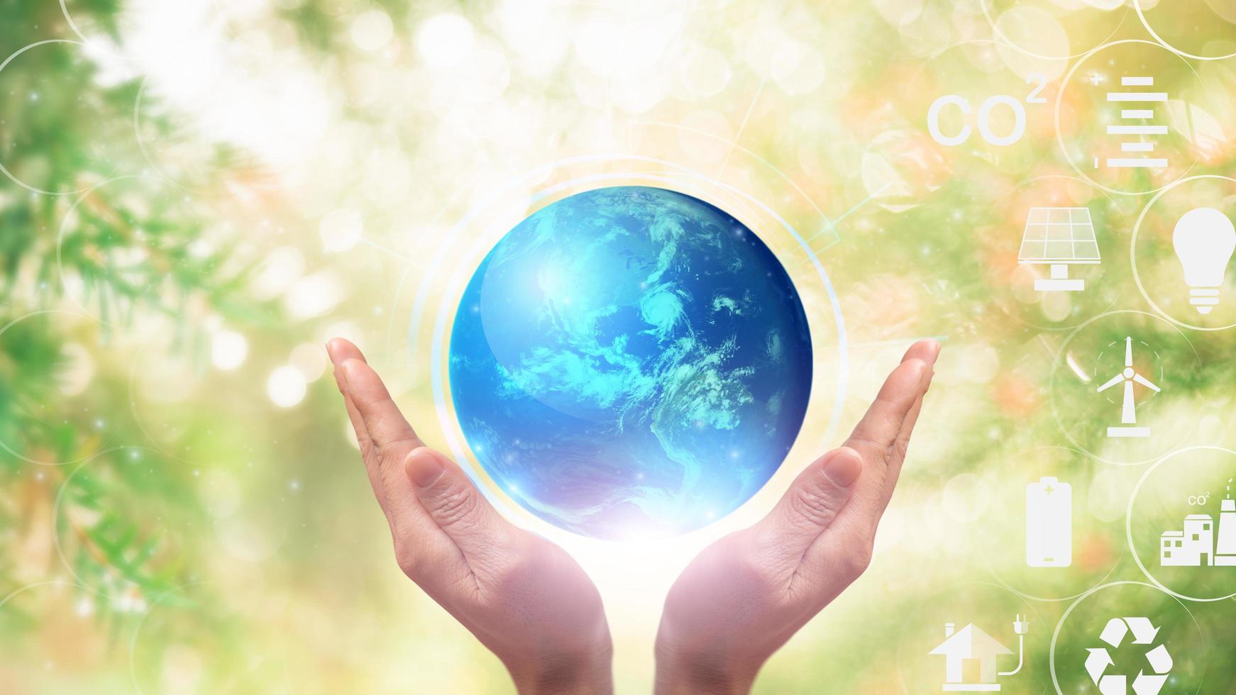 Industrial emissions pollute the environment and ecosystems. Including climate change, hands and the virtual world in green nature, Elements of this image furnished by NASA photo