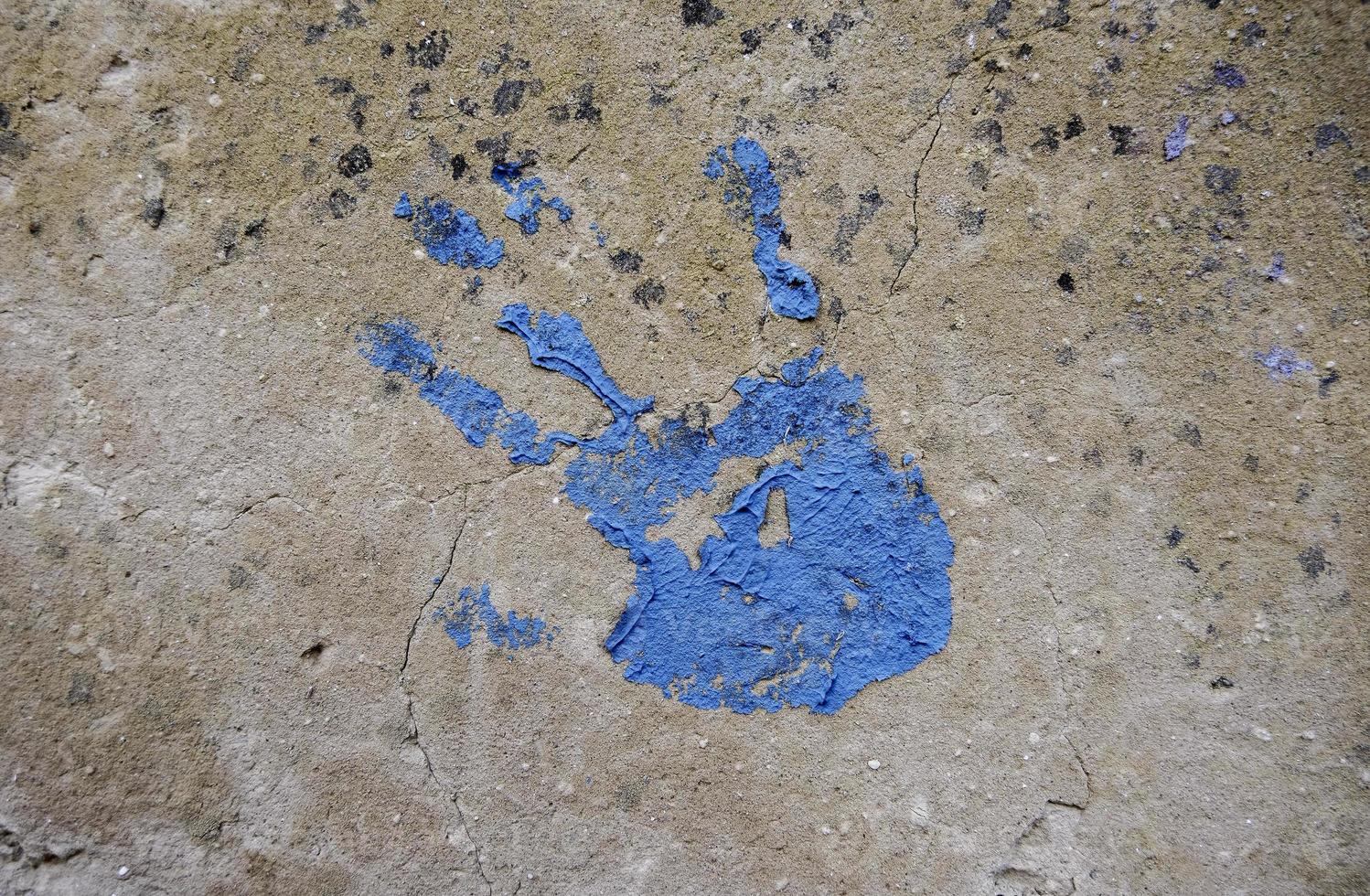 Blue hand painted on the wall photo