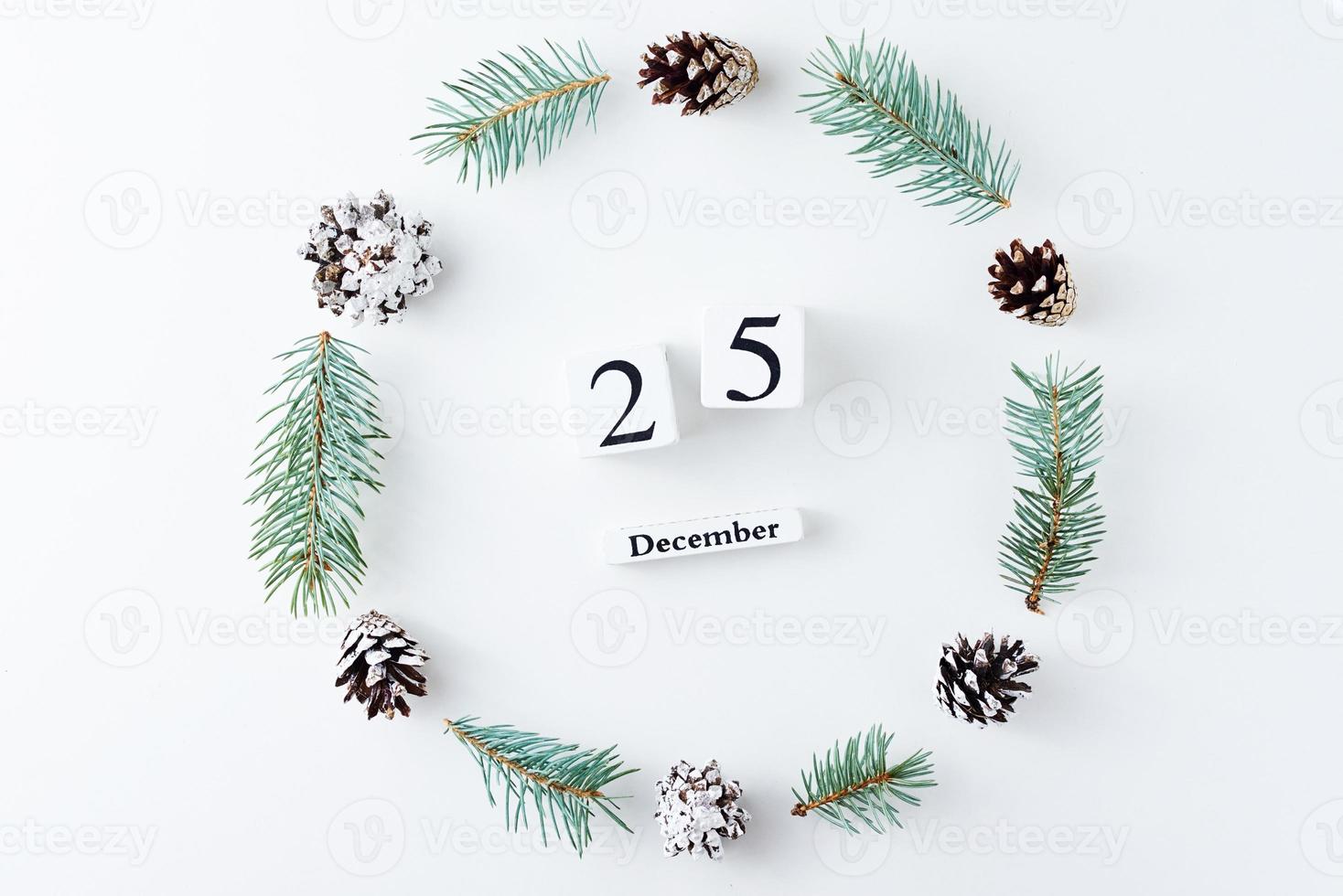 Christmas background made of pine cones and fir tree photo