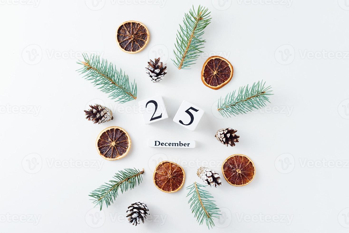 Christmas background made of pine cones and fir tree photo