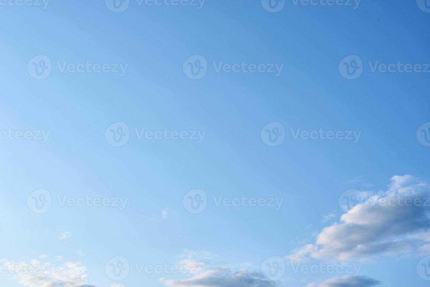 Blue sky with a white clouds, abstract background photo