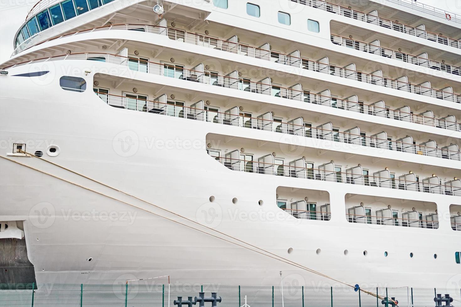 Close up of cruise ship liner docked in the port photo