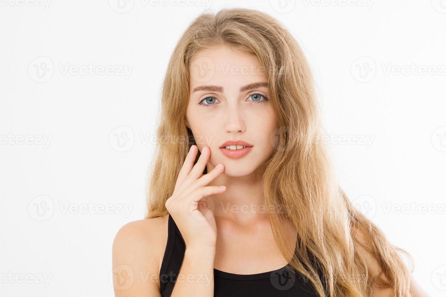 Blonde girl with long and shiny wavy hair style isolated on white background. Young woman facial treatment. Cosmetology and skin care, beauty and spa concept. Copy space photo