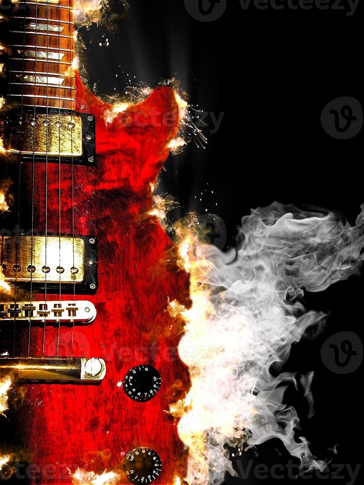 electric guitar burning in fire photo