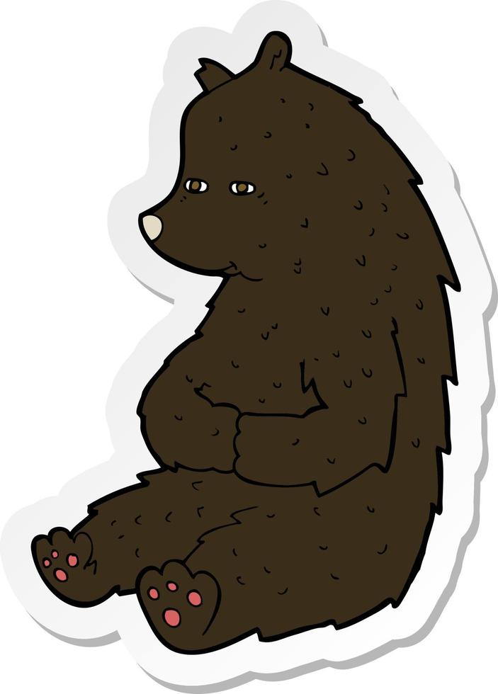 sticker of a cute cartoon black bear vector