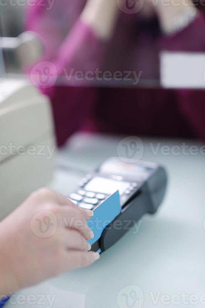 pharmacist suggesting medical drug to buyer in pharmacy drugstore photo