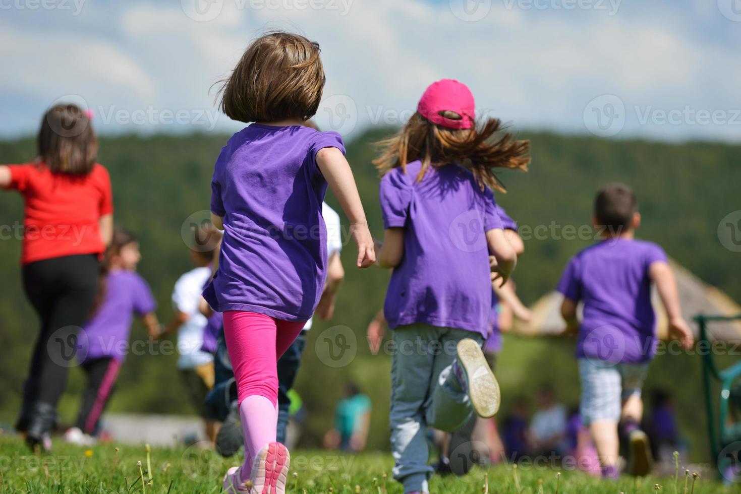 happy kids group  have fun in nature photo