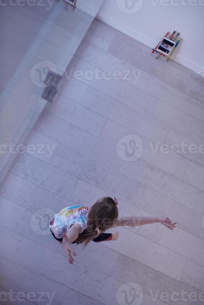 girl online education ballet class at home top view photo