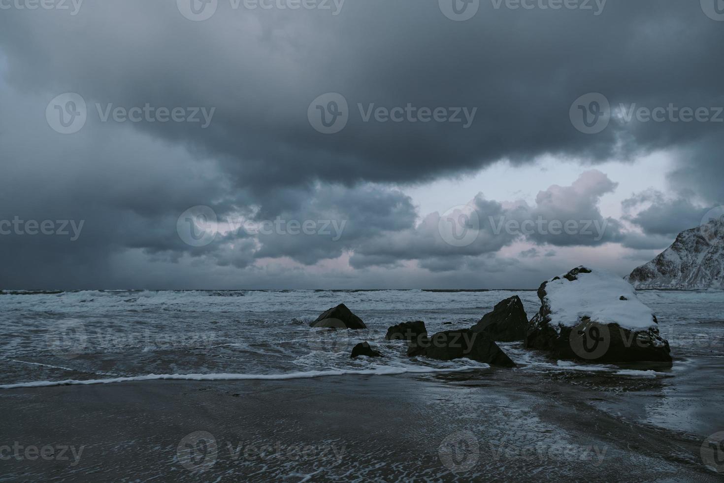 norway coast in winter with snow bad cloudy weather photo