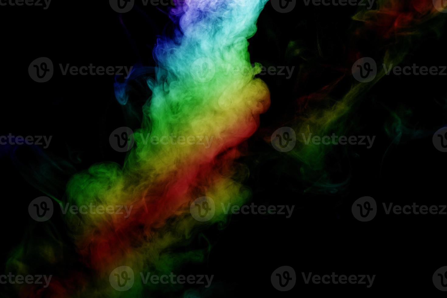 Abstract smoke isolated on black background,Rainbow powder photo