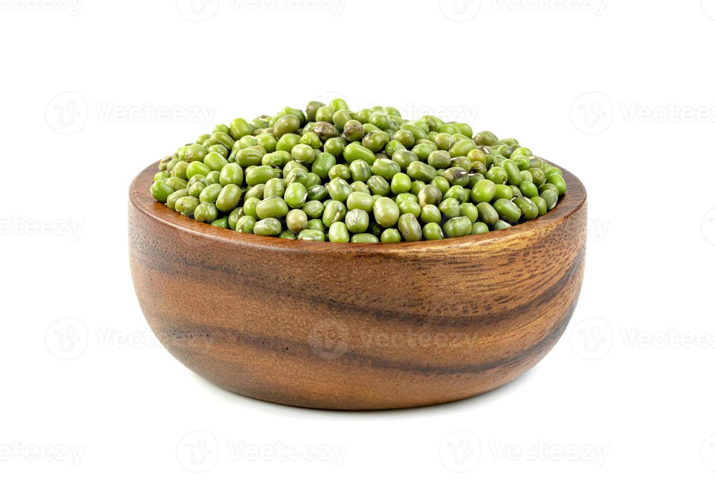 green mung beans with wooden bowl isolated on white background photo