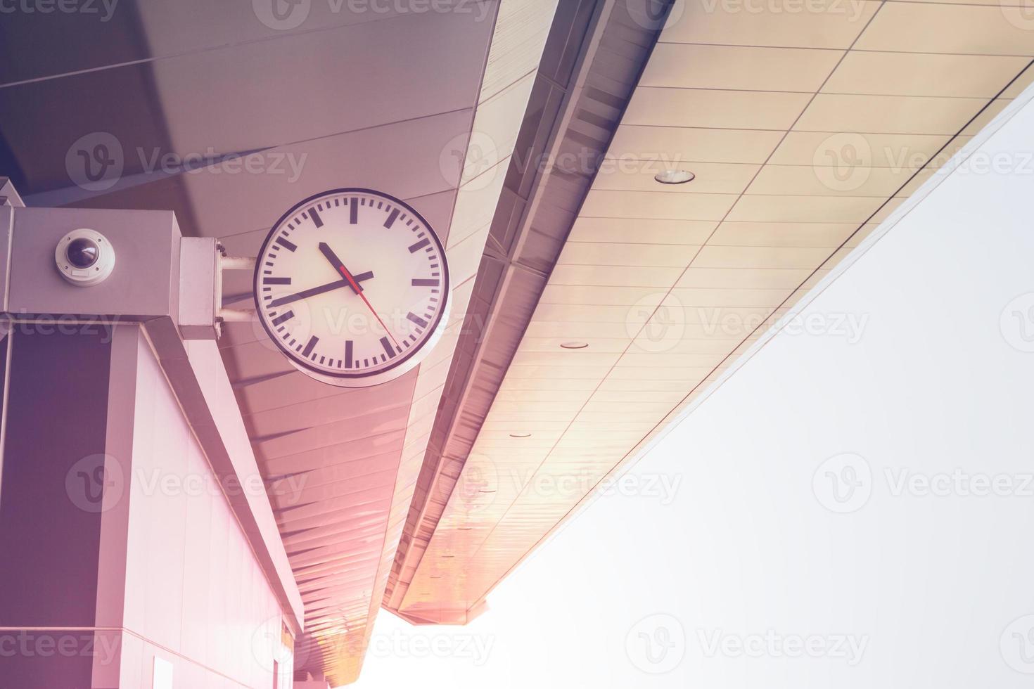 White clock at train station,filter effect photo