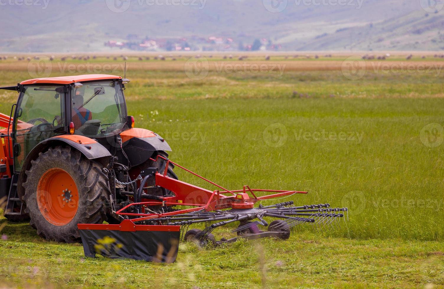 Man driving tractor photo