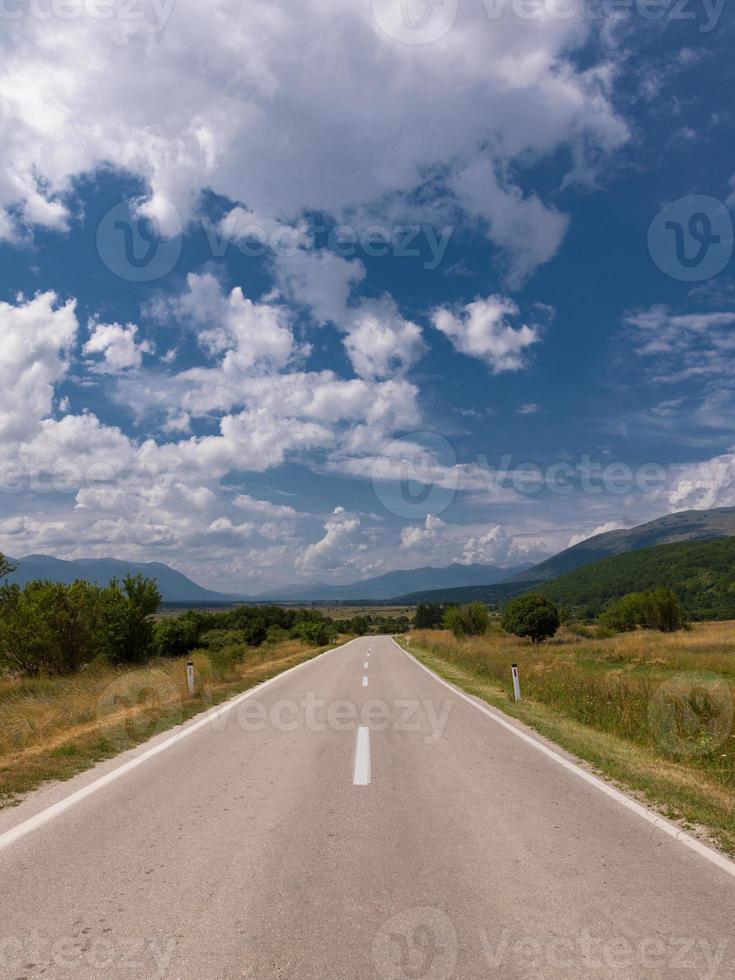 asphalt road in beautiful countryside photo