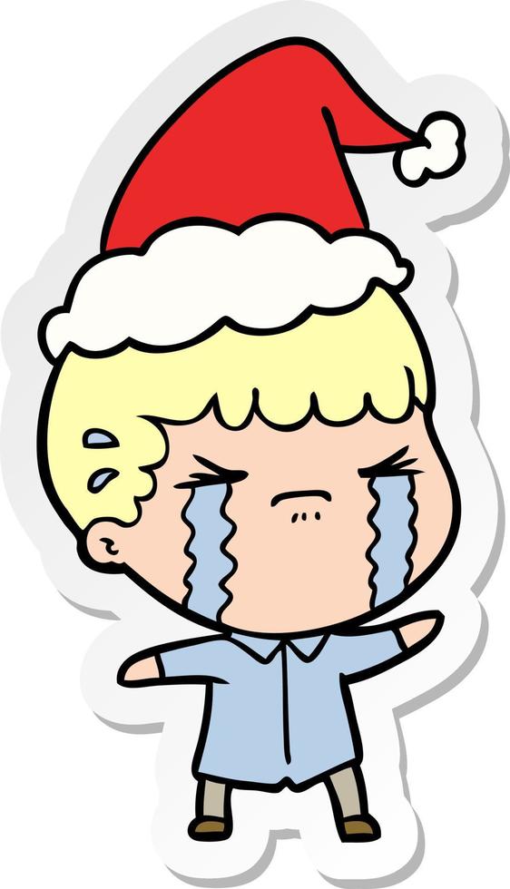 sticker cartoon of a man crying wearing santa hat vector