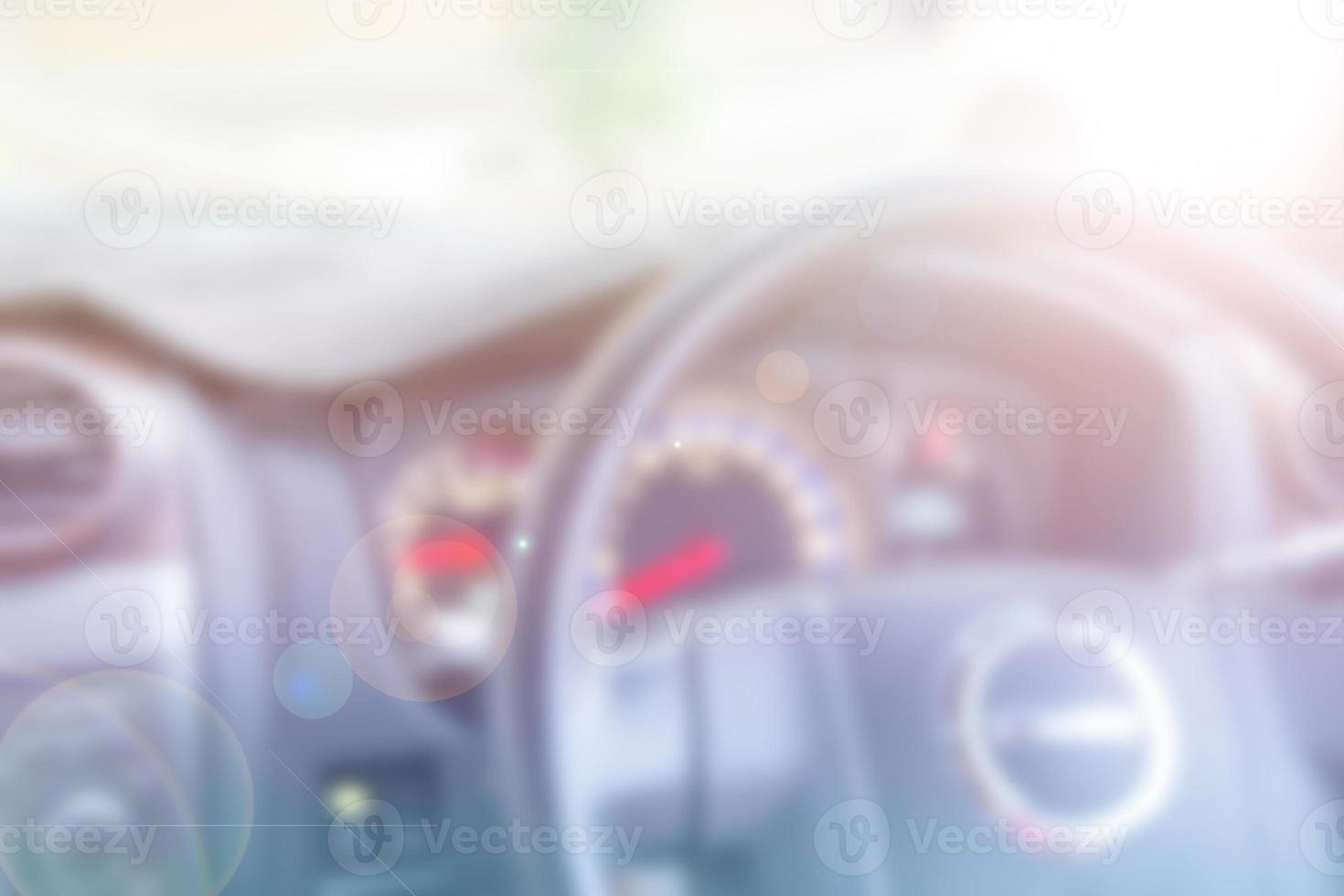 Car interior with steering wheel and Lens Flare of Illustration,Abstract Blurred photo