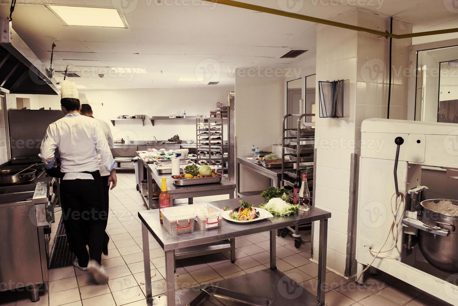 team cooks and chefs preparing meals photo