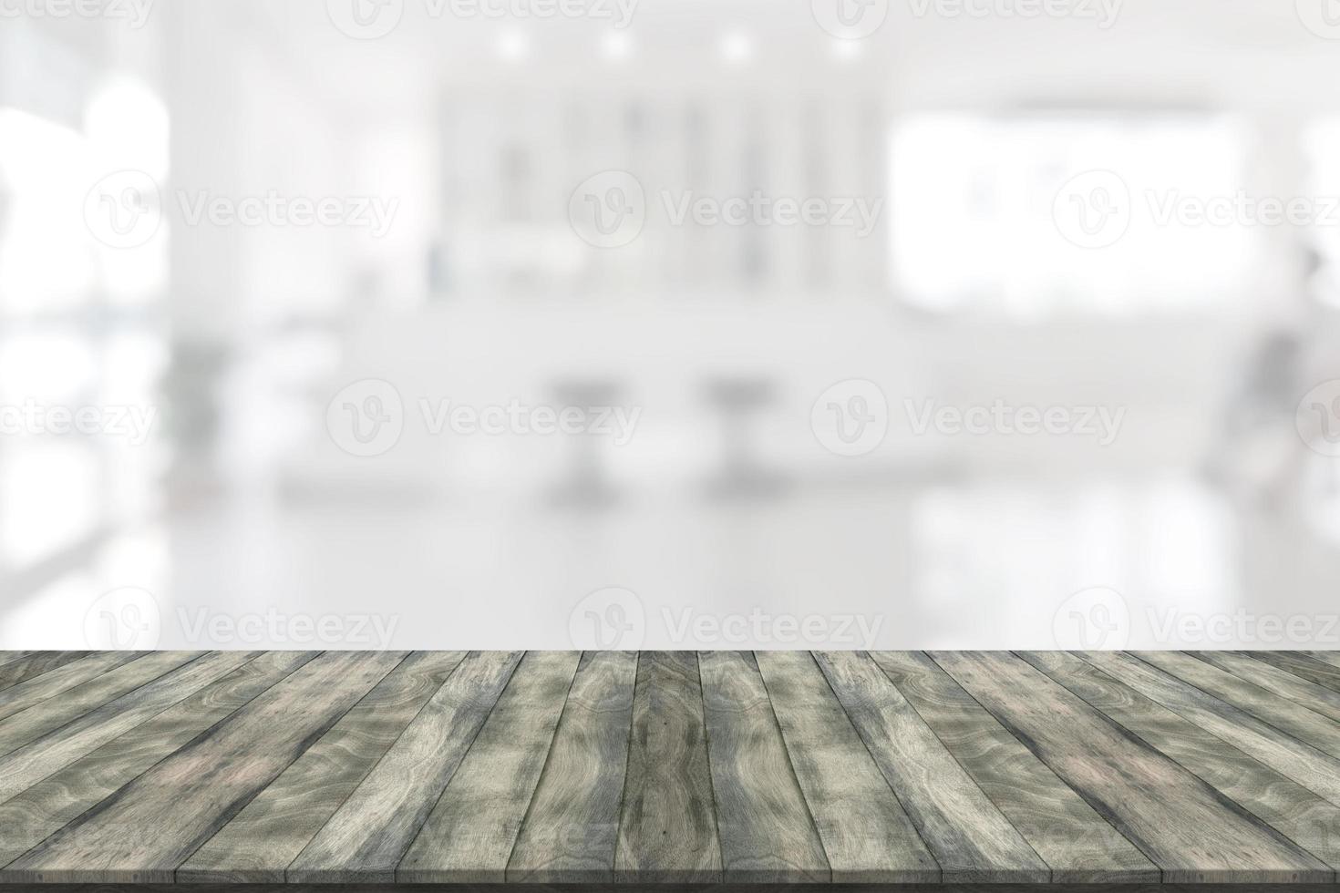 Empty wooden board space platform with register counter blurry background photo