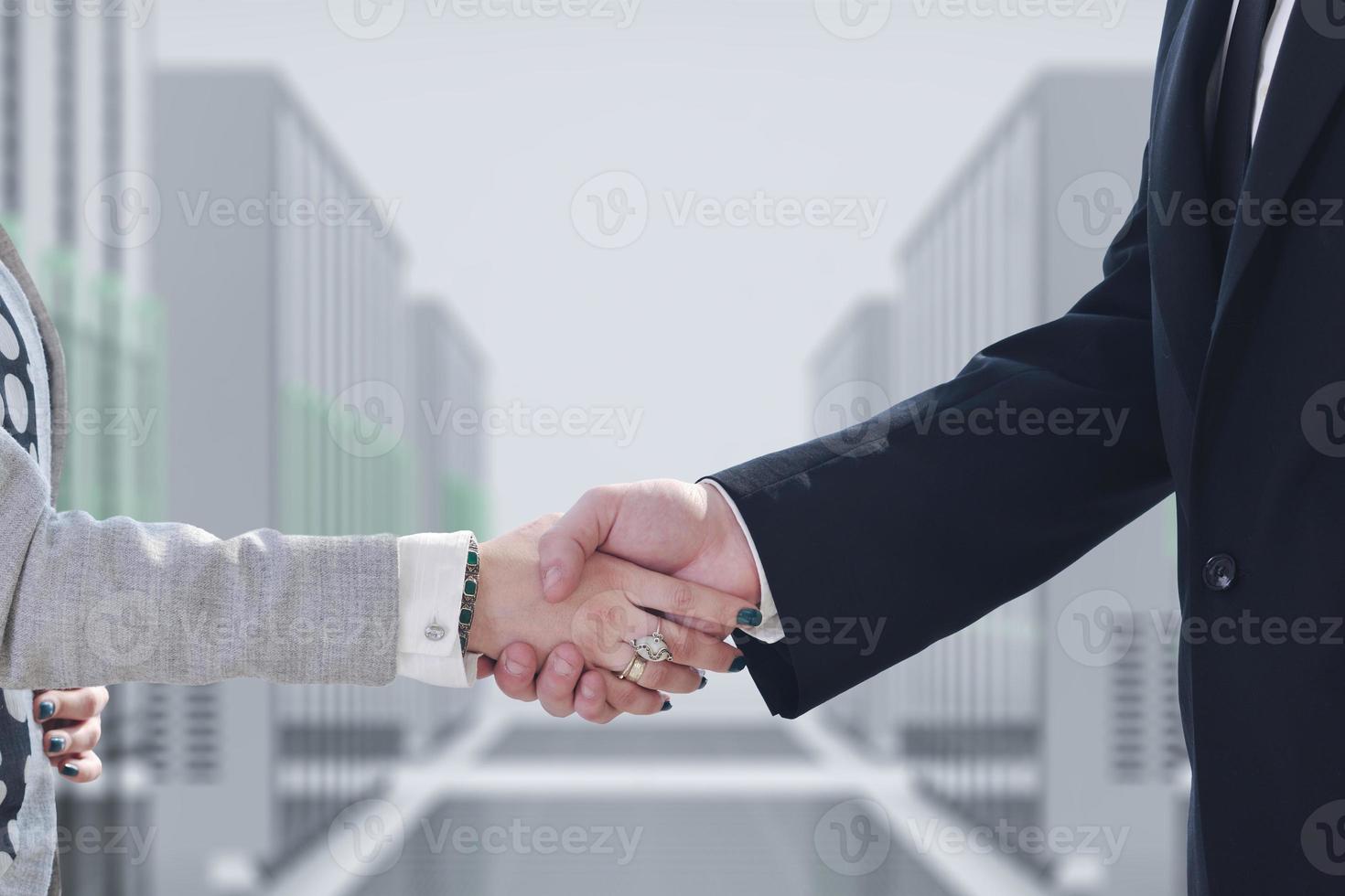 business man and woman handshake on  meeting photo