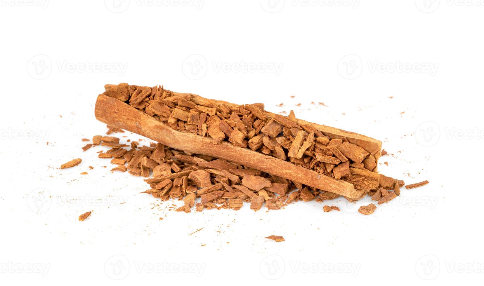 cinnamon sticks and powder isolated on white background photo