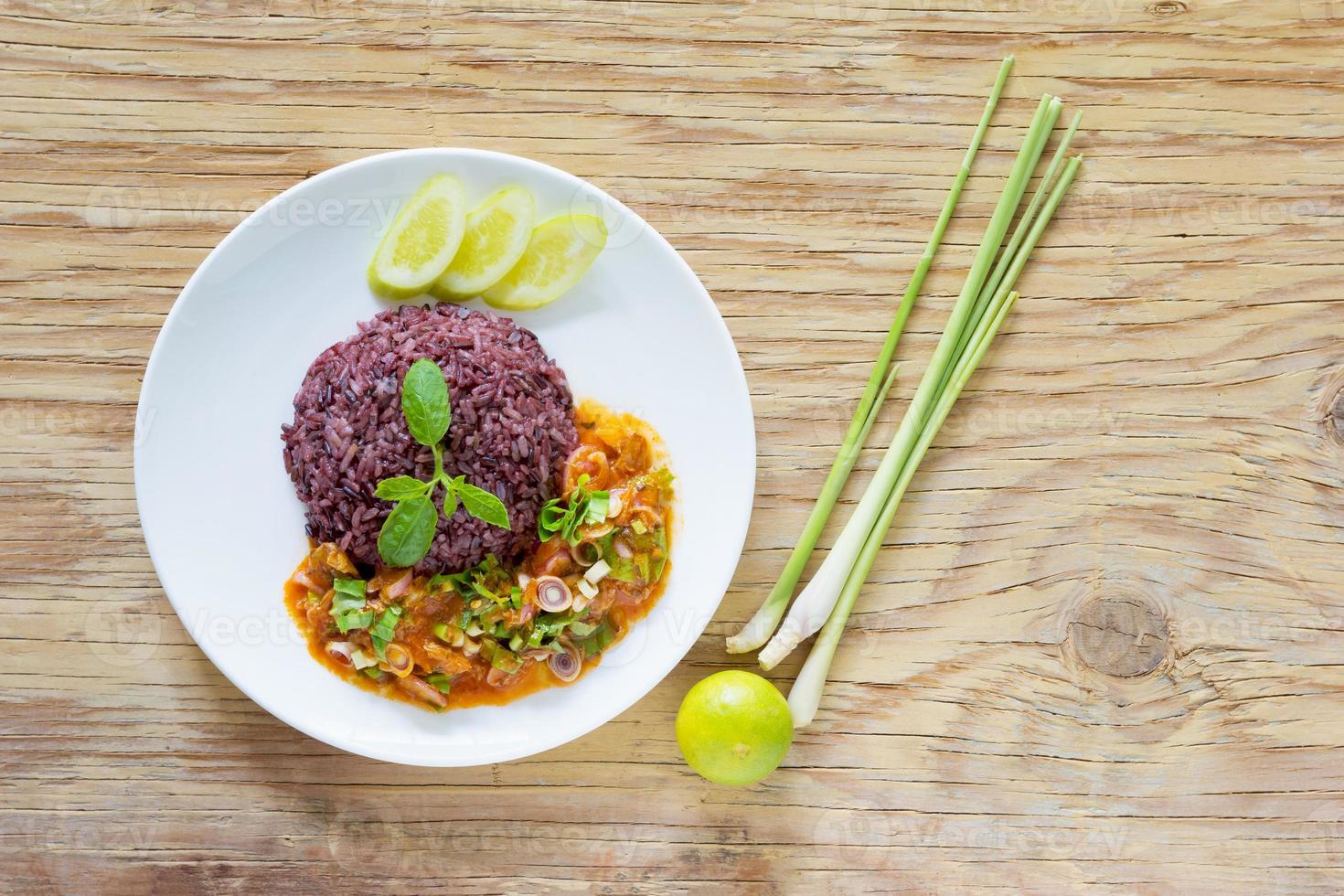 Salad mackerel in tomato sauce with cooked jasmine rice photo