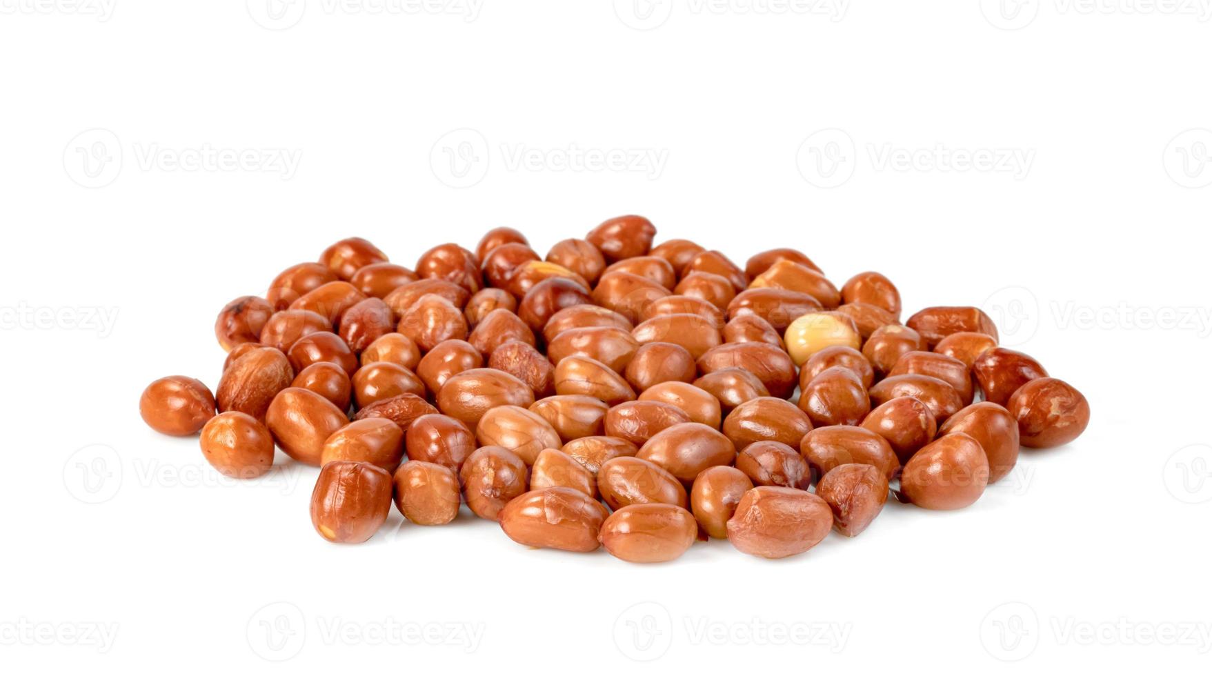 A pile of fried peanuts isolated on white background photo