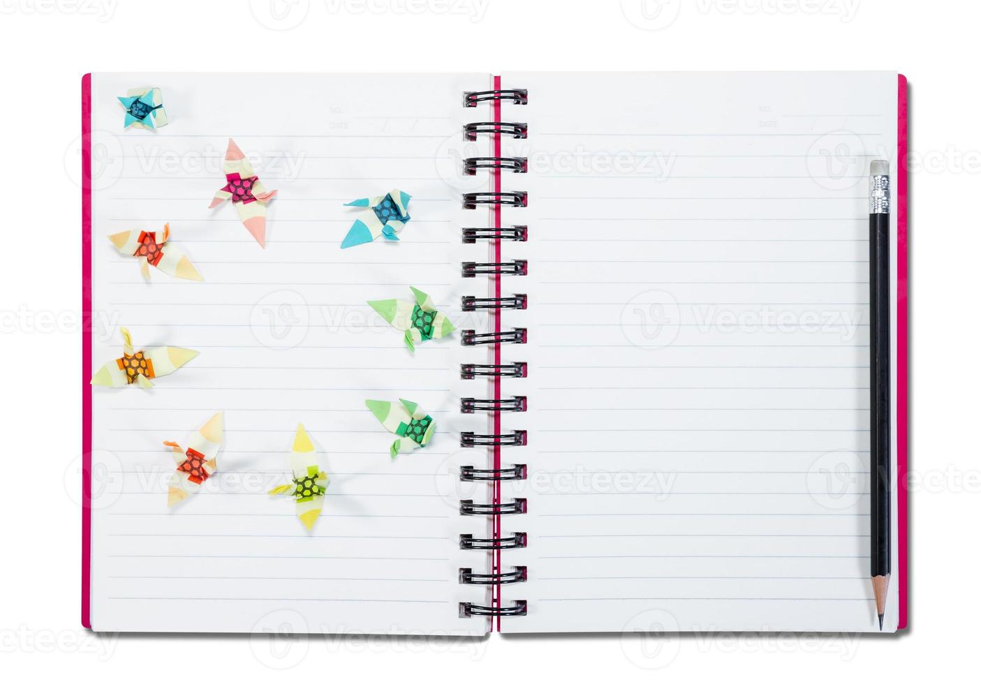 closeup open note book with pencil, isolated on white background,clipping path photo