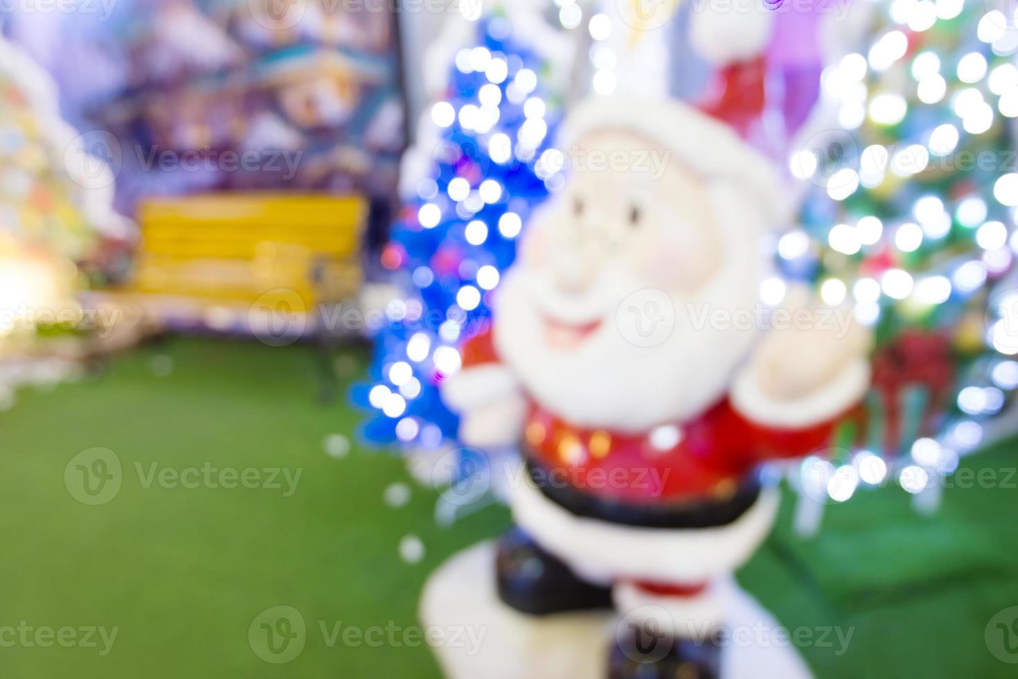 santa claus doll christmas blur background photo