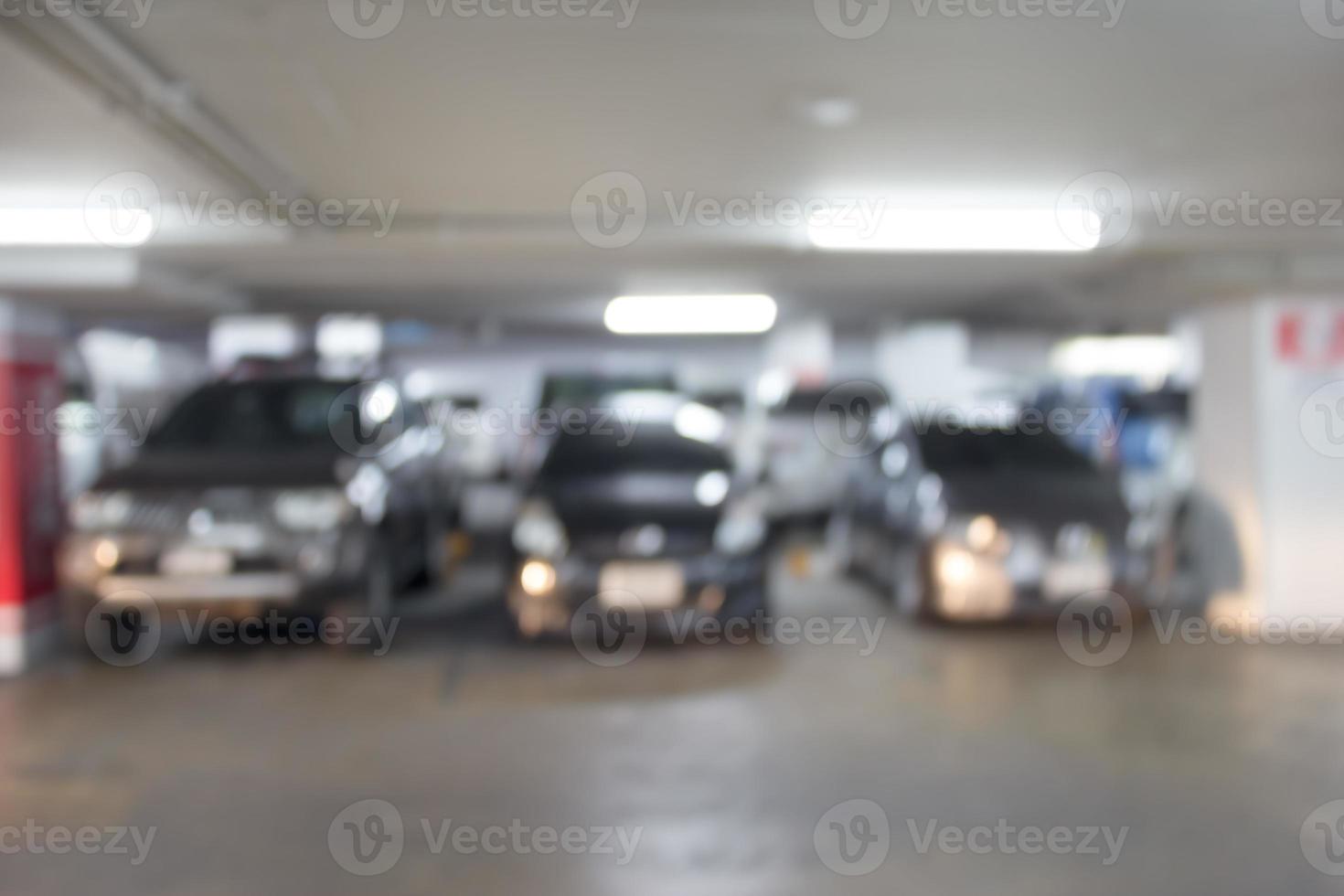 fondo de desenfoque interior del estacionamiento del automóvil, abstracto borroso foto