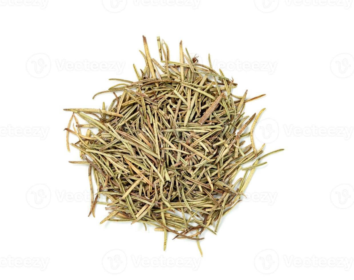 Dry rosemary pile isolated on white background photo