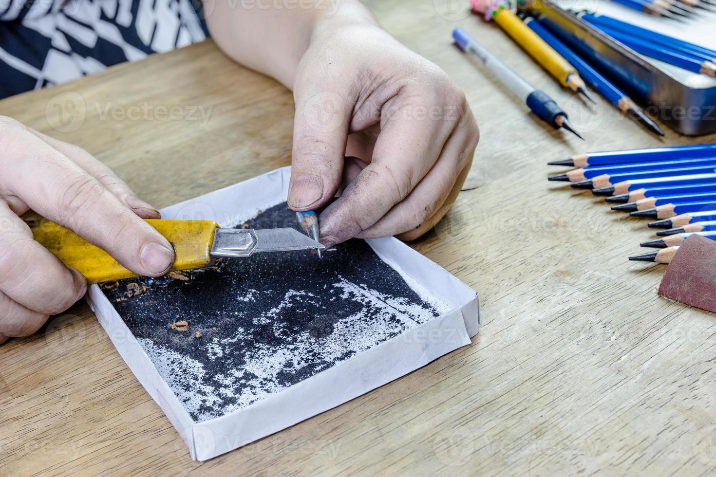 pencil sharpener by cutter knife photo