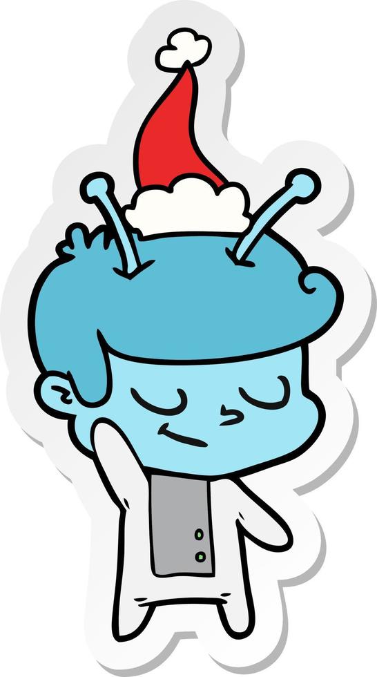 friendly sticker cartoon of a spaceman wearing santa hat vector