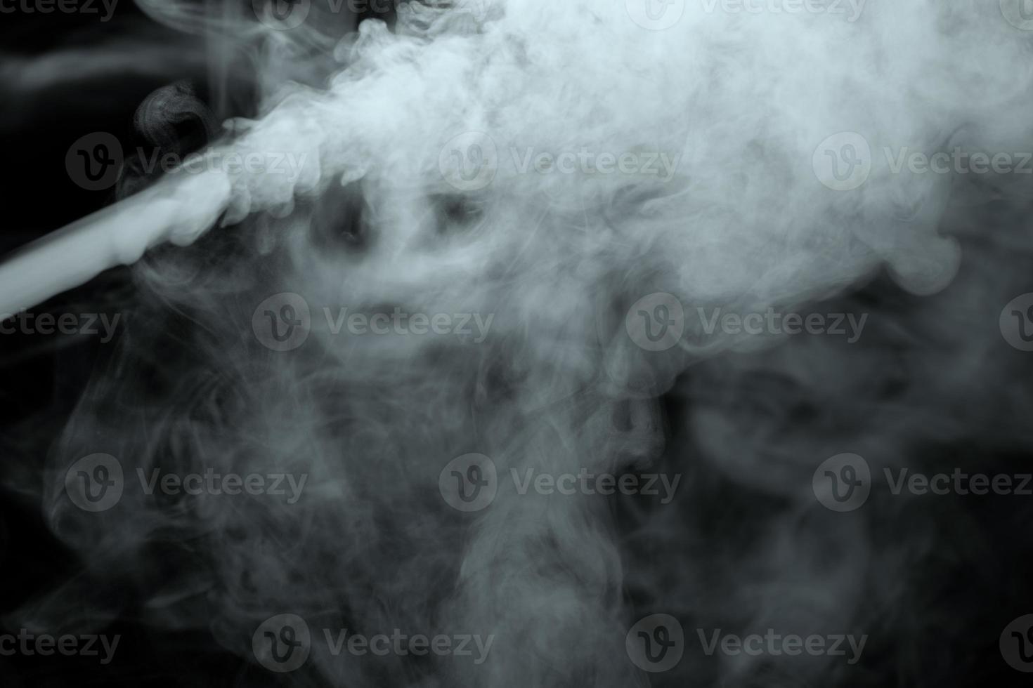 Abstract powder or smoke isolated on black background,Out of focus photo