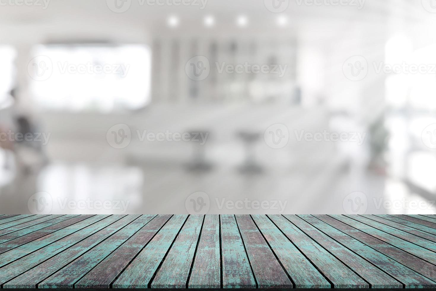 Empty wooden board space platform with register counter blurry background photo