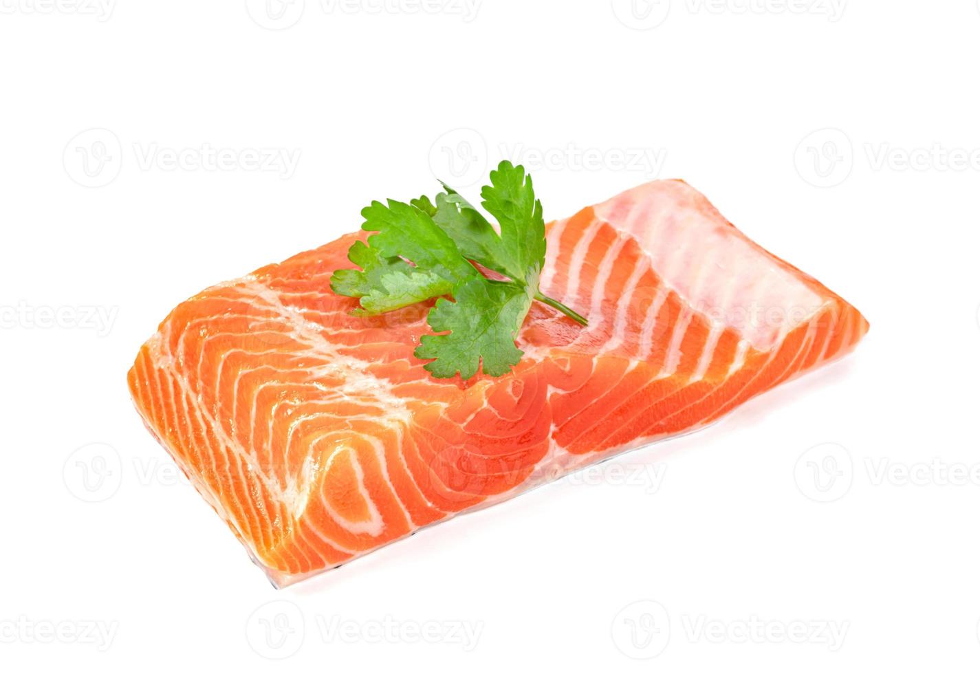 Piece of fresh salmon fillet sliced isolated on white background photo