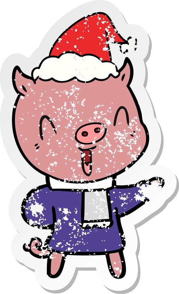happy distressed sticker cartoon of a pig in winter clothes wearing santa hat vector