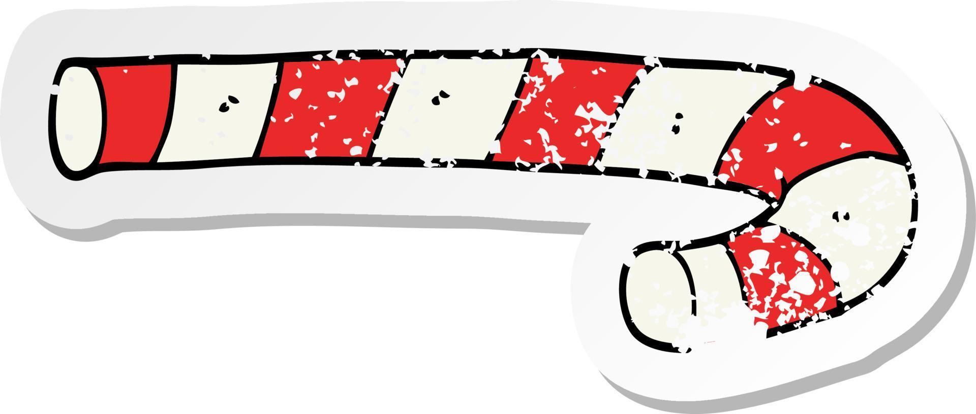 distressed sticker of a cartoon candy cane vector